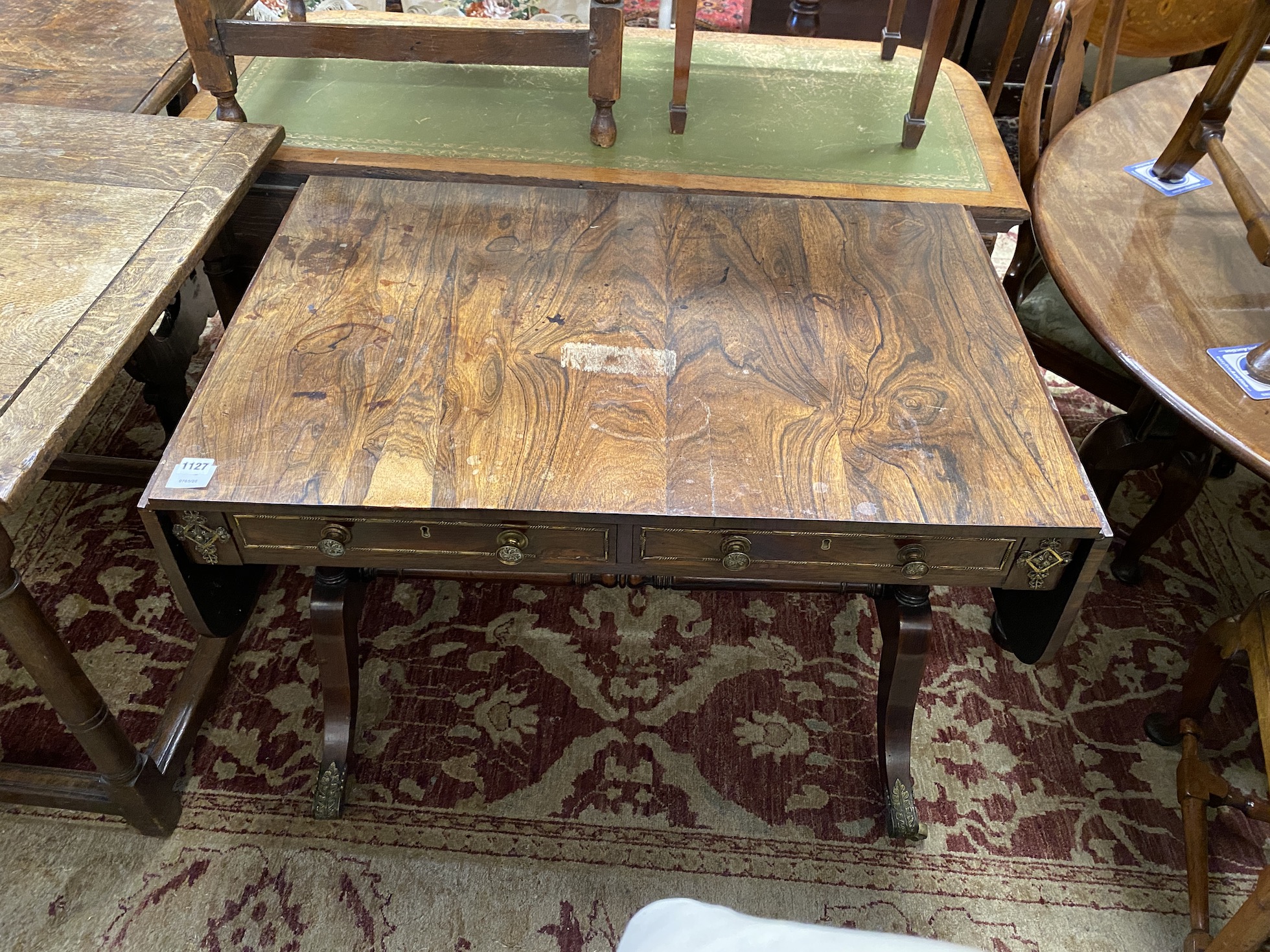 A Regency gilt metal mounted rosewood sofa table, width 95cm, depth 62cm, height 73cm